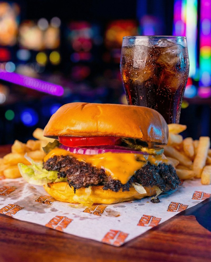 The Number 9 Large lunch deal - double smashed beef with double American cheese, served with chips and a Coca-Cola.