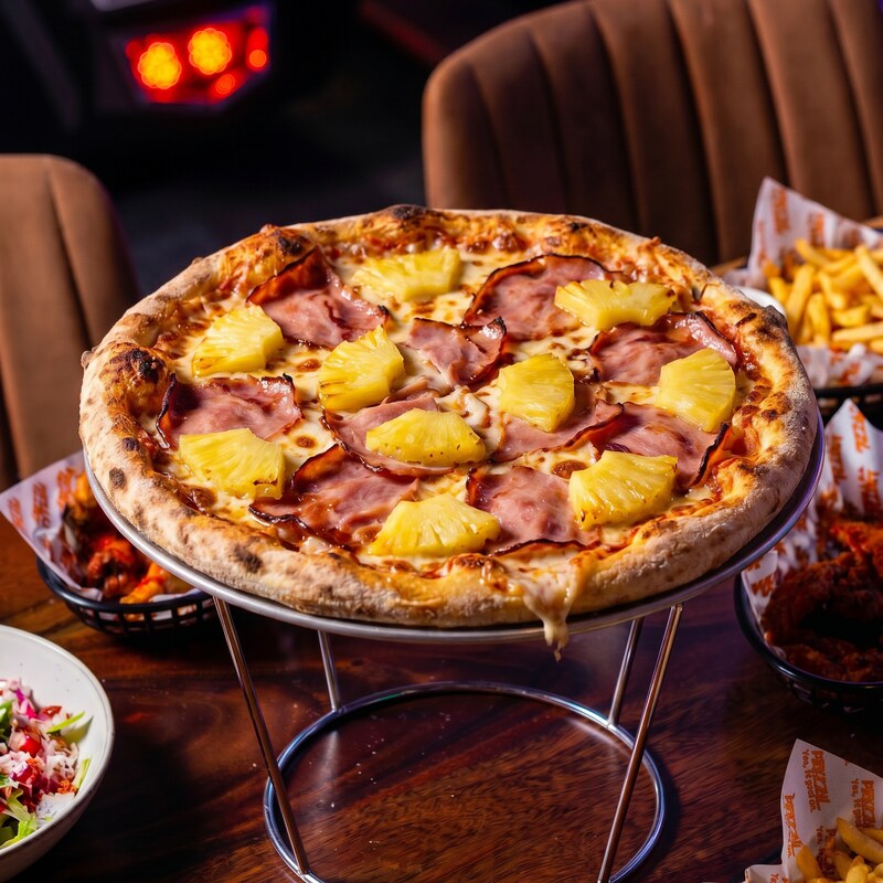 Heist Hawaiian pizza - smoked ham, pineapple chunks and gooey mozzarella.