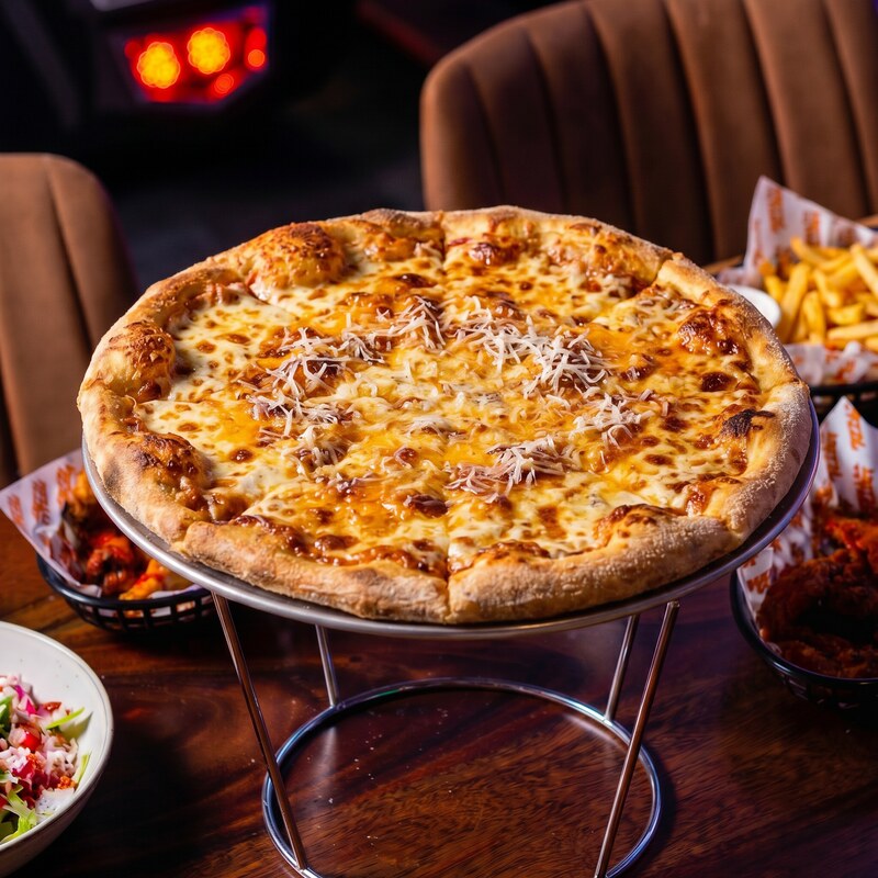 The Big Cheese pizza - mozzarella, cheddar and parmesan on a golden hand-stretched crust.