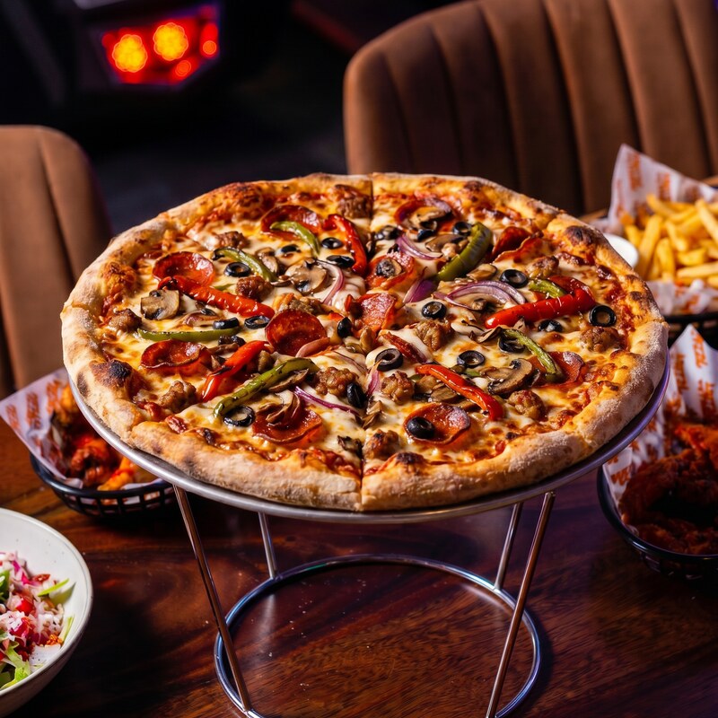 Vice City Supreme pizza - pepperoni, sausage, peppers, onions, mushrooms and olives.