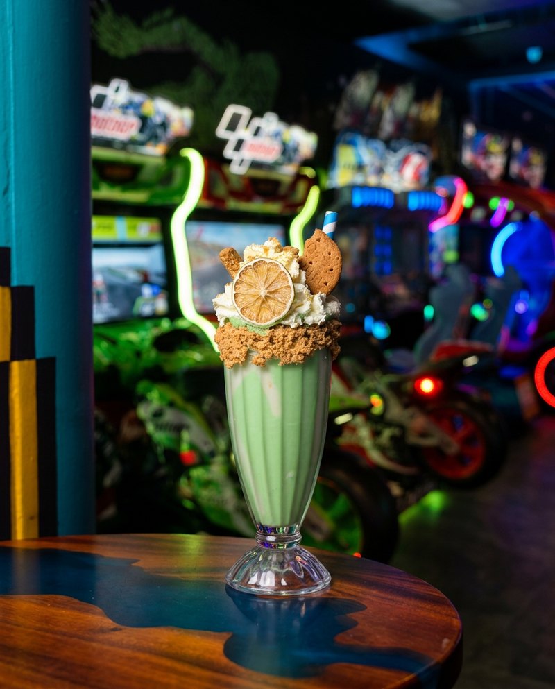 LimeWire Shake - July special. Thick lime, white chocolate and vanilla shake with whipped cream, a fresh lime wheel and a buttery pie-crust crumb rim.